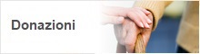 banner Donazioni con foto di una mano di un anziano con un bastone da passeggio che viene accarezzata dalla mano di una donna